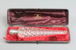 A Victorian silver mounted clear glass spiral scent bottle, London 1886 in a fitted case