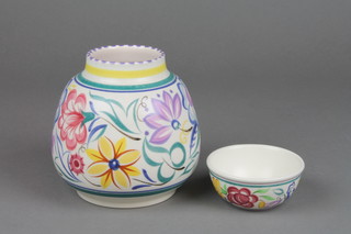 A late 20th Century Poole baluster vase decorated with a wide band of stylised flowers 5", a ditto shallow bowl decorated with birds amongst flowers 3" 