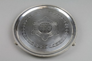 A Victorian circular silver salver with beaded rim and bright cut decoration with presentation inscription, London 1869, 9", approx. 424 grams