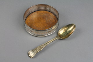 A Victorian silver wine coaster with pierced geometric decoration, Chester 1896, a ditto silver gilt dessert spoon with vineous decoration, London 1839