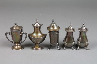 An Edwardian novelty silver trophy pepperette Birmingham 1905 and 4 others