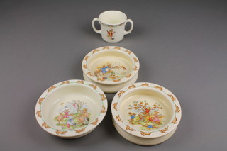 A Royal Doulton Bunnykins 2 handled beaker and 3 ditto childs plates