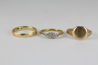 A 14ct gold wedding band, a 9ct signet ring and an 18ct diamond set ring, gross approx. 10 grams