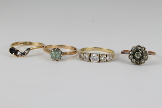 4 gold gem set rings, approx. 8 grams