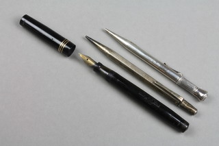 A silver Morden propelling pencil, a Yard O'Lead ditto and a fountain pen 