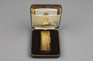 A gentleman's gold plated Dunhill bark finished cigarette lighter