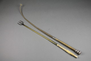 A brass toasting fork with carved bone handle, a plated mounted horse whip
