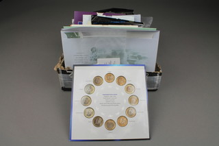 A collection of uncirculated proof and commemorative coins