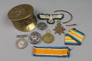 A WWI trio to 16/770 Pte. S Moffatt R.IR.RIF. a Trench art shell army cap, minor badges