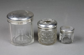 2 silver mounted toilet jars and a ditto hair tidy