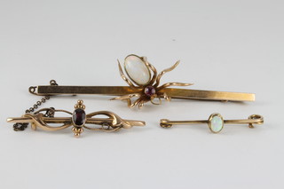 A 9ct gold novelty bar brooch in the form of a spider with opal body and garnet set head and 2 other bar brooches