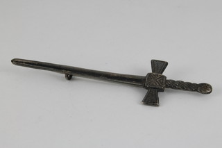 A silver sword bar brooch
