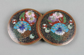A cloisonne buckle decorated with stylised flowers