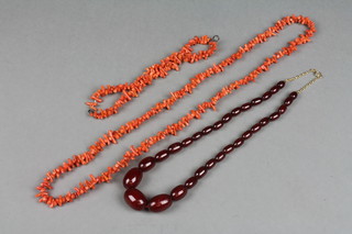 A coral necklace, a ditto bracelet and a bead necklace