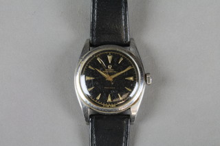 A gentleman's steel cased Rolex oyster perpetual wristwatch with black dial and bubble back case, inscribed 848366, 35mm wide (The face is pitted and the glass is scratched. The strap is not original)