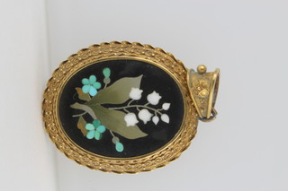 A Victorian pietra dura pendant in a gold Etruscan style mount 
