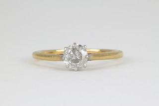 An 18ct yellow gold single stone claw set diamond ring, approx. 0.5ct