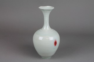 A contemporary Studio celadon oviform vase with waisted neck 11"