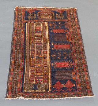 A Persian Balochi rug 58" x 32 1/2" 