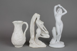 A bisque figure of a naked lady 13", a Studio figure of a naked lady and a moulded Belleek jug