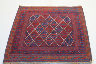A red and blue ground Tabriz with diamond all-over design to the centre 48" x 47" 