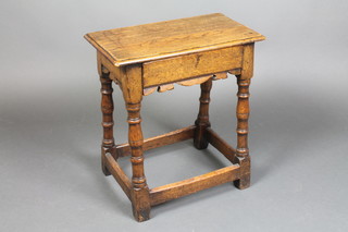 A 17th/18th Century style rectangular oak joined stool fitted a drawer and raised on turned and block supports 20"h x 18"w x 10"d