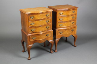 A pair of Queen Anne style figured walnut chests of serpentine outline with cross banded tops, fitted 4 long drawers and raised on cabriole supports 30 1/2"h x 17"w x 13"d 