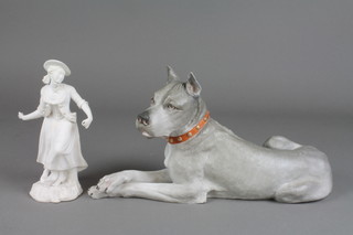 A Continental bisque figure of a reclining hound 13", a bisque figure of a lady in 18th Century costume 7" (f)