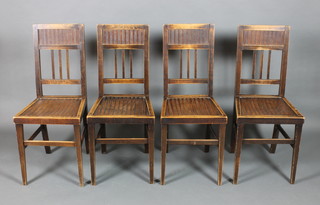 A set of 4 beech framed Liberty style stick and bar back dining chairs with solid seats on square tapering supports