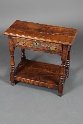 A 17th Century style rectangular oak side table fitted a drawer and with undertier, raised on turned supports 23"h x 24"w x 11"d 