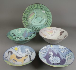 Tessa Fuchs, a Studio Pottery shallow bowl decorated with a stylised bird 12", 4 small ditto