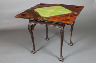 An Edwardian mahogany envelope card table fitted a drawer with blind fret work decoration and brass swan neck drop handles, raised on cabriole ball and claw supports 28 1/2"h x 23"w x 23"d 