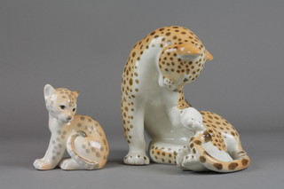 A Russian figure of a seated leopard 7", a ditto of a cub 4"