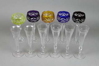 A set of 4 coloured hocks with tapered stems, a single ditto and 6 champagne flutes
