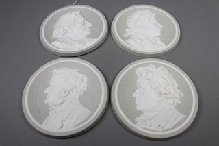 4 two colour bisque plaques depicting Wagner, Beethoven, Mozart and Liste 7 1/2" 