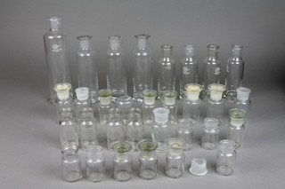 A collection of various chemistry specimen vases 