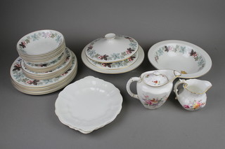 A Royal Doulton Camelot pattern dinner service comprising 6 dinner plates, 5 side plates, 5 sandwich plates, 7 soup bowls, 2 tureens and covers, minor decorative china