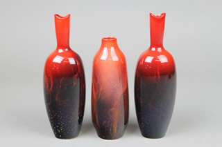 A pair of modern Royal Doulton flambe veined flattened oviform vases no. 1603, 7", a ditto tapered vase no.1614 5 1/2" 