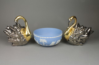 A Wedgwood blue Jasperware bowl decorated classical figures 10", a pair of lustre figures of exotic birds 8" 