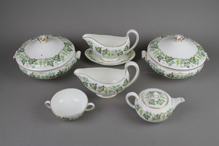A Wedgwood Santa Clara part dinner and tea service comprising 16 dinner plates, 11 side plates, 12 sandwich plates, 6 small plates, 3 oval meat plates, 6 2 handled bowls and 6 saucers, 1 tea cup, 7 saucers, 4 tureens and covers, 2 sauce boats and 3 stands, 12 dessert bowls, a breakfast teapot, 1 dish, 1 slop bowl and 2 ashtrays