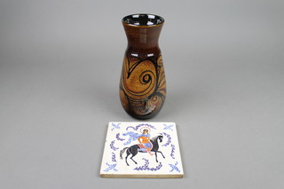 A Carter polychrome wall tile decorated with a figure on horseback 6", a 1960's Poole brown glazed oviform vase 9 1/2"