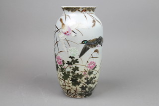 An early 20th Century Japanese oviform vase decorated with birds amongst flowers 10" 