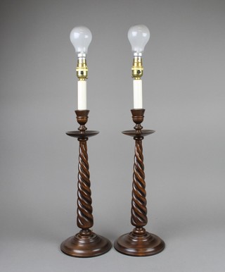 A pair of spiral turned mahogany table lamps 13" 