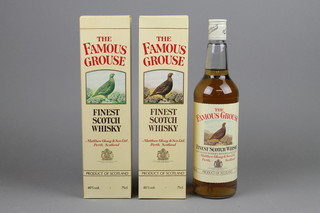 2 75cl bottles of Famous Grouse whisky 