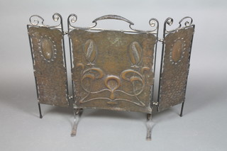 An Art Nouveau  wrought iron and embossed copper 3 fold fire screen, leg f, 