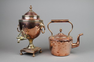 A Regency oval copper twin handled tea urn raised on square foot and bun feet, complete with iron slug  13 1/2" and a Victorian oval copper kettle 