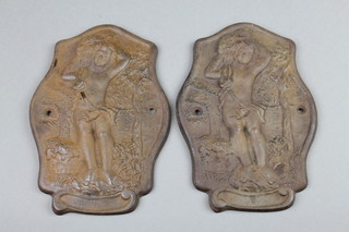A pair of cast iron plaques decorated bacchanalian figures 9" 