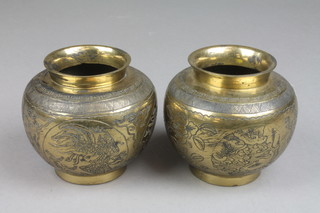 A pair of Chinese cylindrical bronze sensors with engraved decoration, the bases with seal marks 4"