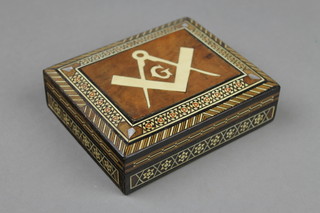 A Moorish rectangular inlaid cigarette box the hinged lid decorated a Masonic device 1"h x 5"w x 4"d 