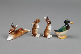 3 Royal Doulton figures of rabbits HN2594 4" and K38 2" and K39 2" and a ditto figure of a duck HN807 2 1/2" 